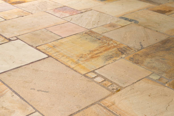 Lime sandstone slabs laid irregularly on the terrace