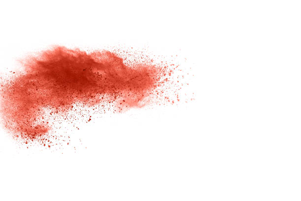 istock living coral color powder explosion on white background. Colored cloud. Colorful dust explode. Paint Holi. 1146331711