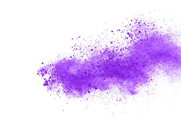 istock Powder explosion. Closeup of a purple dust particle explosion isolated on white. Abstract background. 1146331784