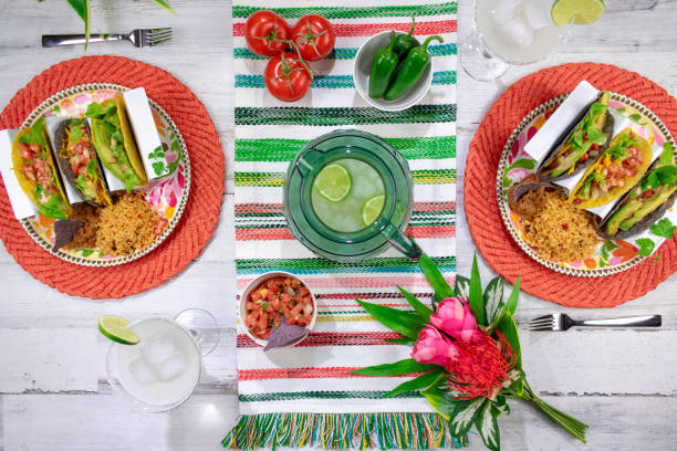 istock Colorful Mexican food flat lay with tacos and margaritas 1146332692