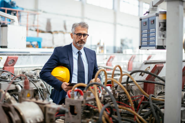 istock Factory worker. Refinery. Mature engineer. Quality inspector. Mature male engineer in production 1146336788