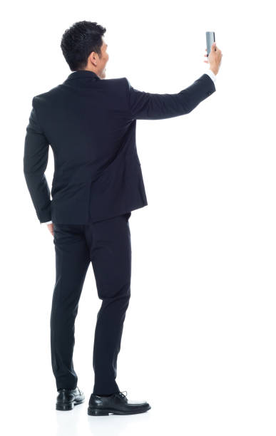 istock Attractive looking Chinese businessman - taking a selfie 1146349895