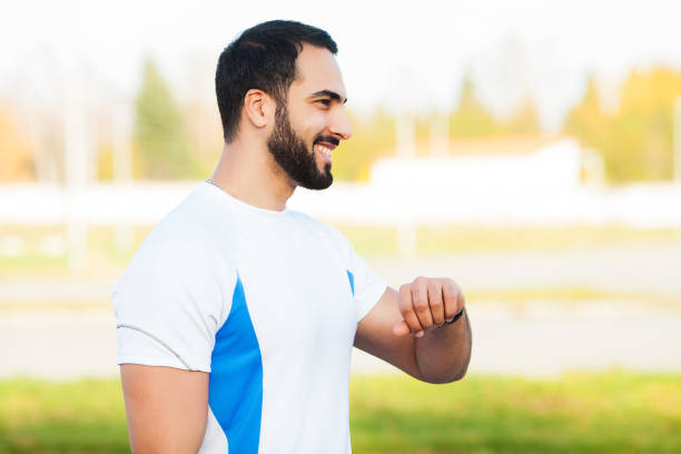 istock Fitness. Exhausted runner man resting on the park after workout 1146351036