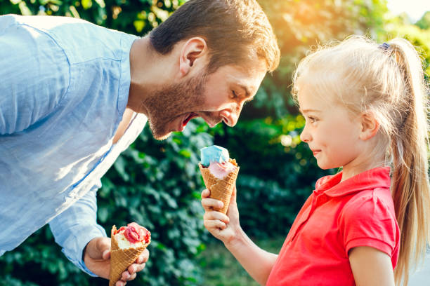 istock Father and daughter walk outdoors family time 1146355018
