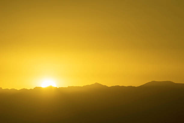 The sun rises over the mountain.Helan mountain, Inner Mongolia, China.
