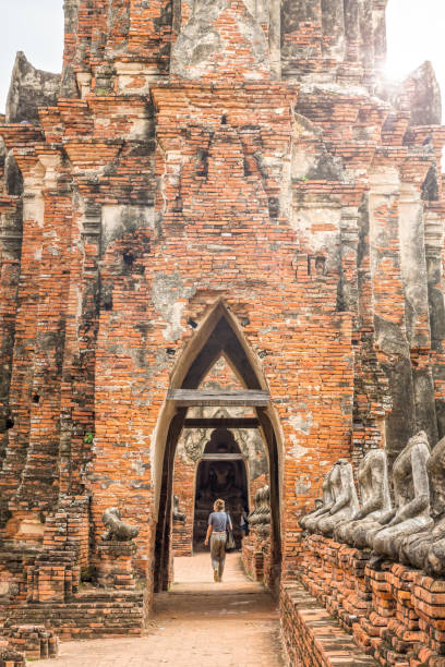 istock Tourists on walkway at Wat Chaiwatthanaram 1146363070