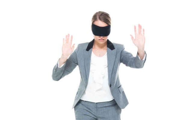 istock Businesswoman wearing blindfold 1146364955