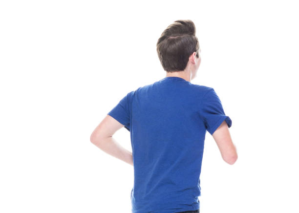 istock Young high school age male running 1146365699