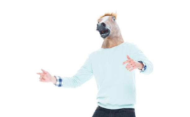 istock Man with horse mask is being silly 1146366908