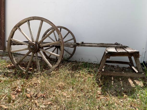 istock Antique wooden wheelbarrow and support bench 1146367653