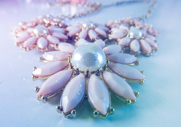 flowers pearl necklace with water drops on it