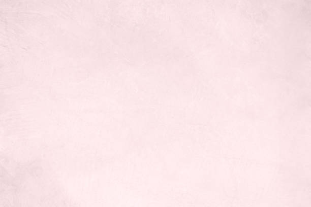 istock Pink white pastel rough crack cement texture stone concrete,rock plastered stucco wall; painted flat fade background gray solid floor grain. 1146395781