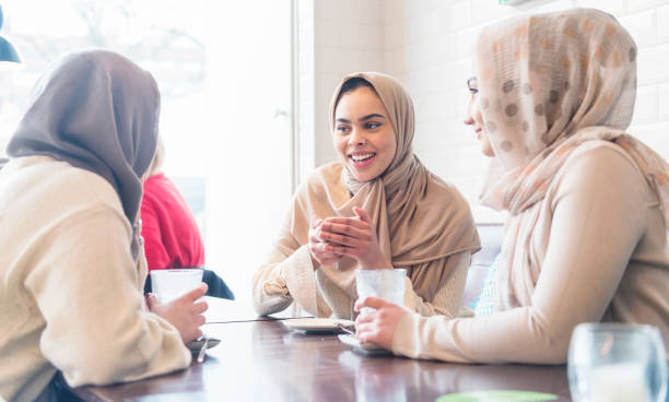 istock Muslims girls chatting in a cafe 1146397229