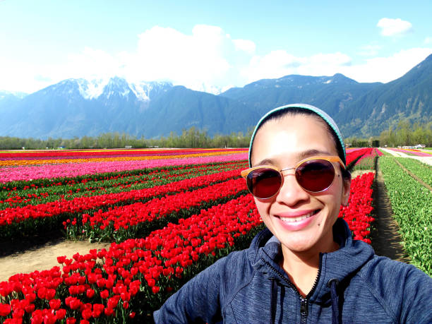istock Selfie Woman Tulip 1146402008