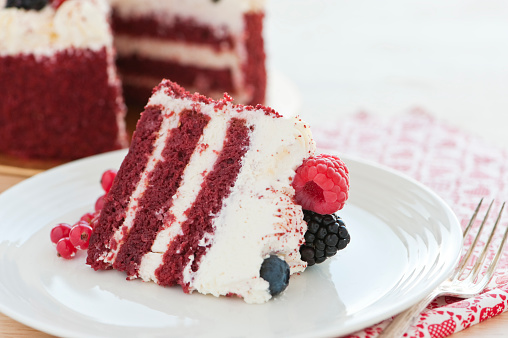close-up of sliced red velvet cake