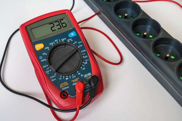 istock Measurement of voltage in electrical socket - digital multimeter 1146407033