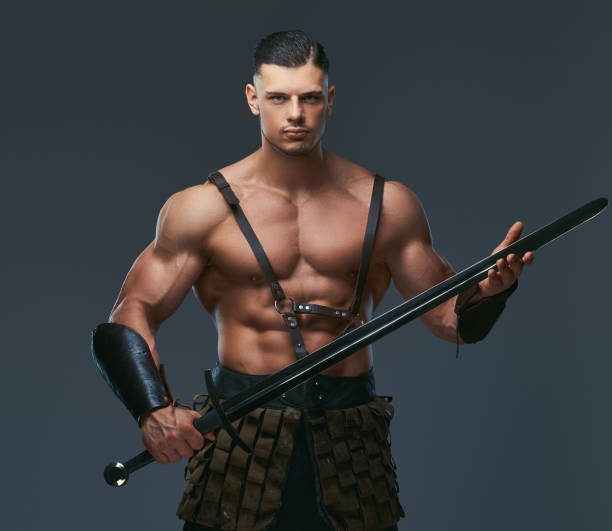 istock Brutal ancient Greece warrior with a muscular body in battle uniforms 1146414308