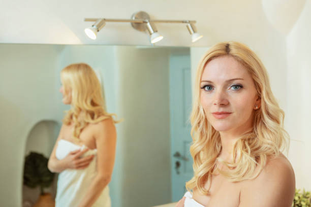 istock woman in bathroom 1146414319