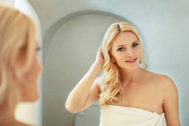 istock woman in bathroom 1146414336