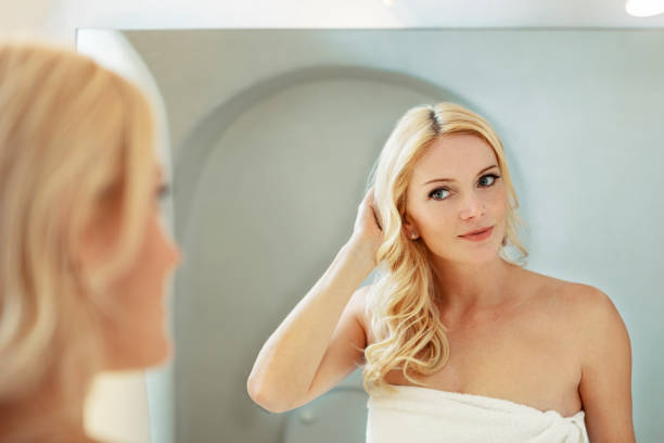 istock woman in bathroom 1146414429
