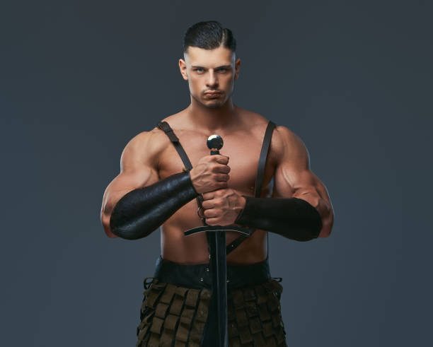 istock Brutal ancient Greece warrior with a muscular body in battle uniforms 1146414525