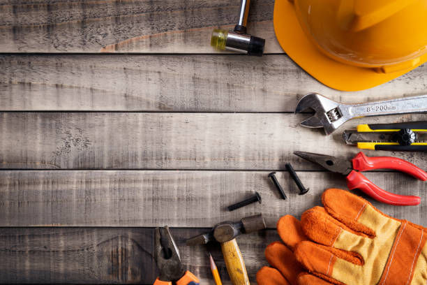 istock Labour Day,  Many handy tools on wooden background texture. 1146415577