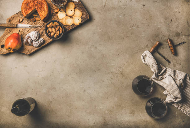 gleasses of red wine, wine bottle, appetizers on wooden board - italian cuisine wine food pasta imagens e fotografias de stock
