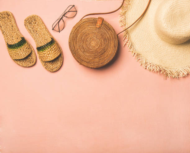 istock Variety of summer apparel items over pastel background, copy space 1146418679