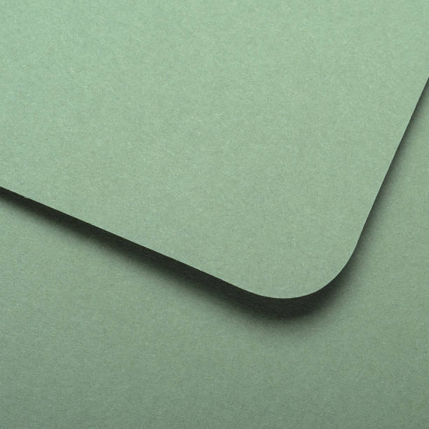 istock Green paper close up. Abstract background, texture. 1146420391