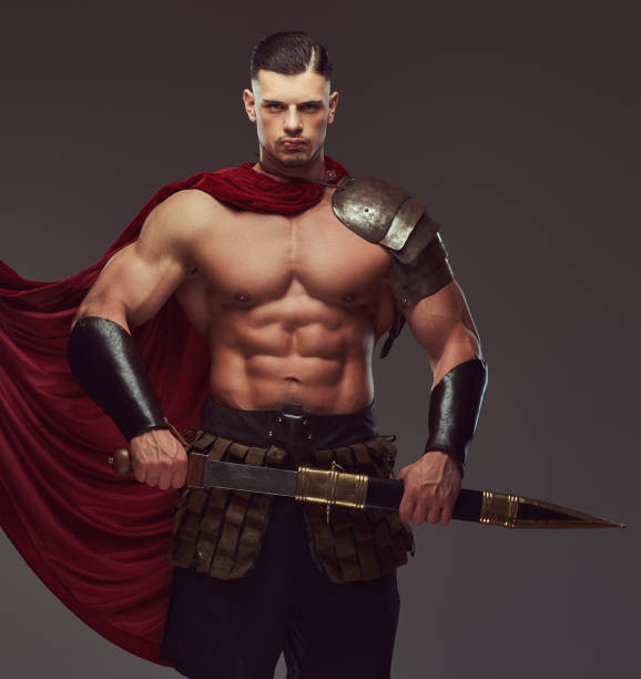 istock Brutal ancient Greece warrior with a muscular body in battle uniforms 1146423210