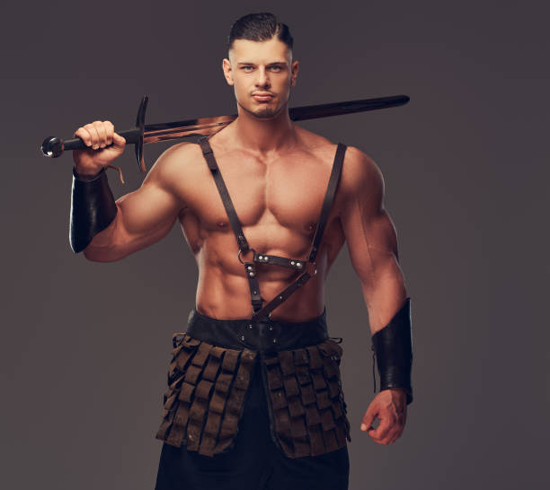 istock Brutal ancient Greece warrior with a muscular body in battle uniforms 1146423217