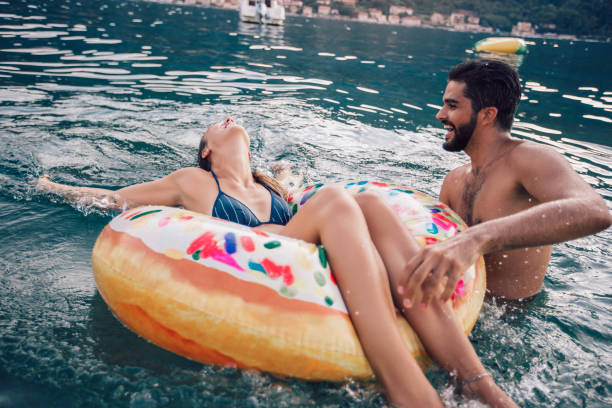 istock Sexy young couple on the beach having fun 1146428675