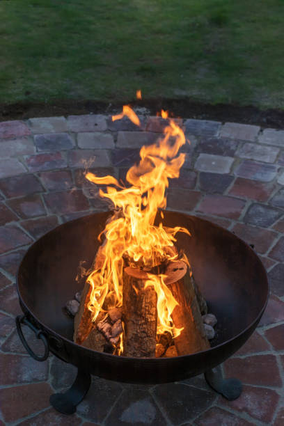 istock Romantic fire in a fire bowl in your own garden 1146429740