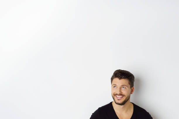 istock Young cheerful man against white background 1146435559