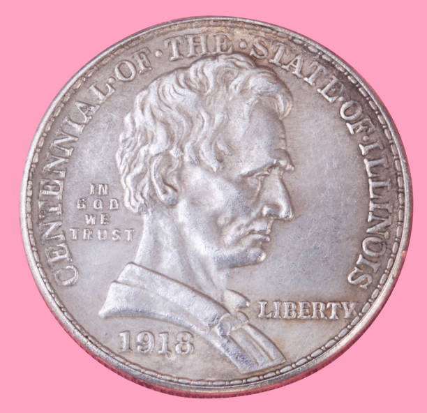 istock half dollar coin isolated on pink background 1146435866