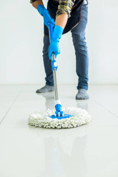 istock Low Section Of Man Cleaning Tiled Floor At Home 1146446112