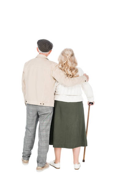 istock back view of senior couple standing isolated on white 1146449637