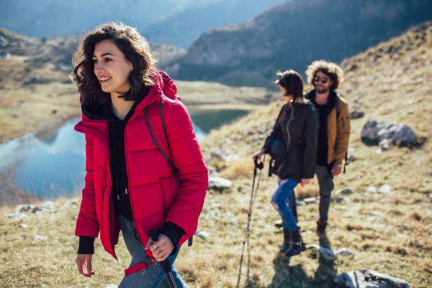 istock Group of hikers walking on a mountain at autumn day 1146450977