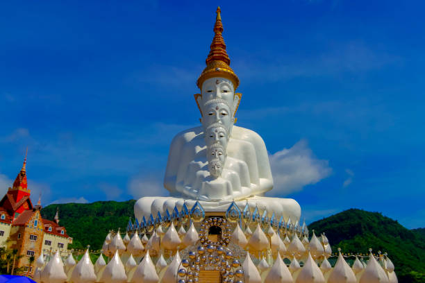 istock five white Buddha with sky at Wat Pha Sorn Kaew, Khao Kho, Phetchabun, THAILAND. 1146451231