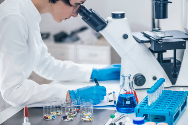 istock Medical Researcher Looking Through the Microscope 1146451325