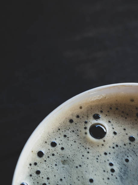 istock Coffee cup top view on wooden table background 1146453224