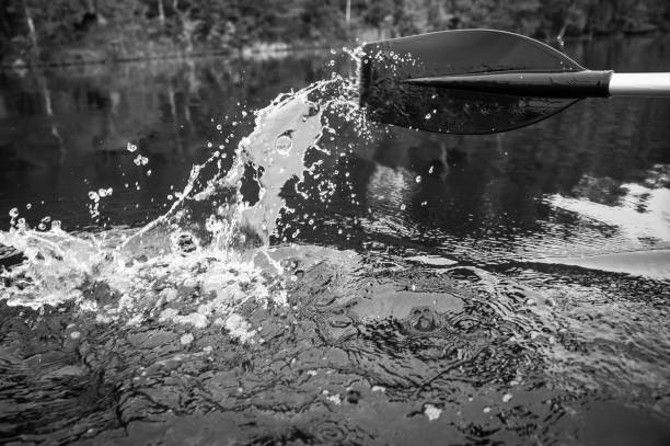 paddle of a boat with water splashes
