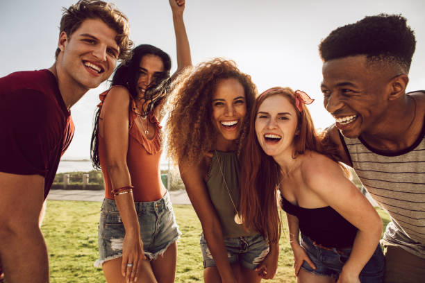 istock Cheerful friends dancing outdoors 1146456530