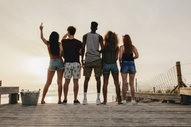 istock Young people partying at beach 1146457228