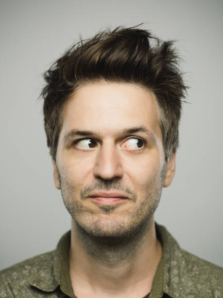istock Real caucasian man with blank expression looking to the side 1146460622