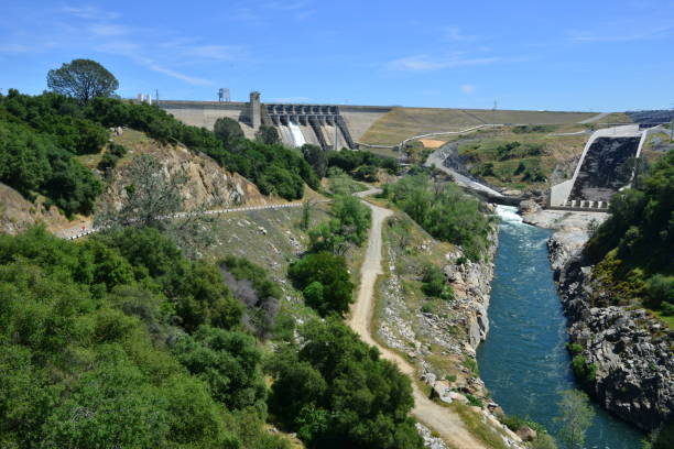 istock Folsom Dam in California with a sluice gate open. 1146463072