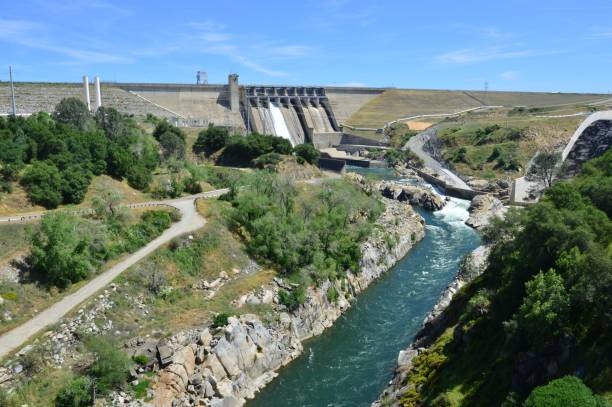 istock Folsom Dam in California with a sluice gate open. 1146463177