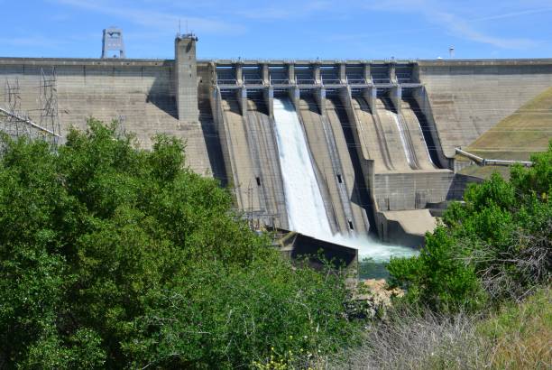 istock Folsom Dam in California with a sluice gate open. 1146463237