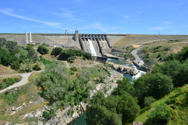 istock Folsom Dam in California with a sluice gate open. 1146463296