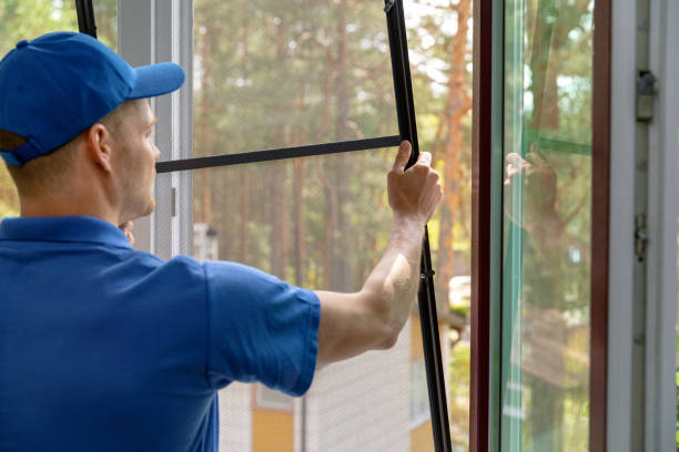 worker installing mosquito net wire mesh in plastic window frame - mesh screen metal wire mesh imagens e fotografias de stock